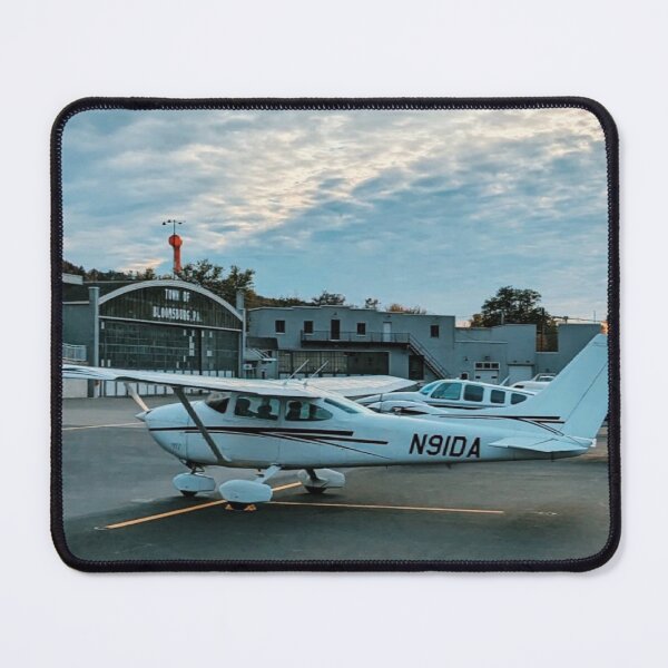 Item preview, Photo with a white airplane N9IDA without people parked at the airport designed and sold by CraftMuse19.