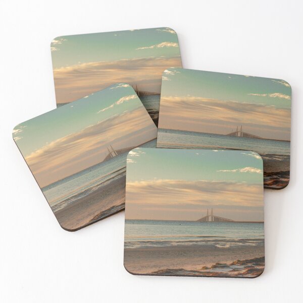 Item preview, The Sunshine Skyway Bridge stretches gracefully across Tampa Bay at dawn, bathed in soft golden light as the new day begins designed and sold by EyezWatchin.