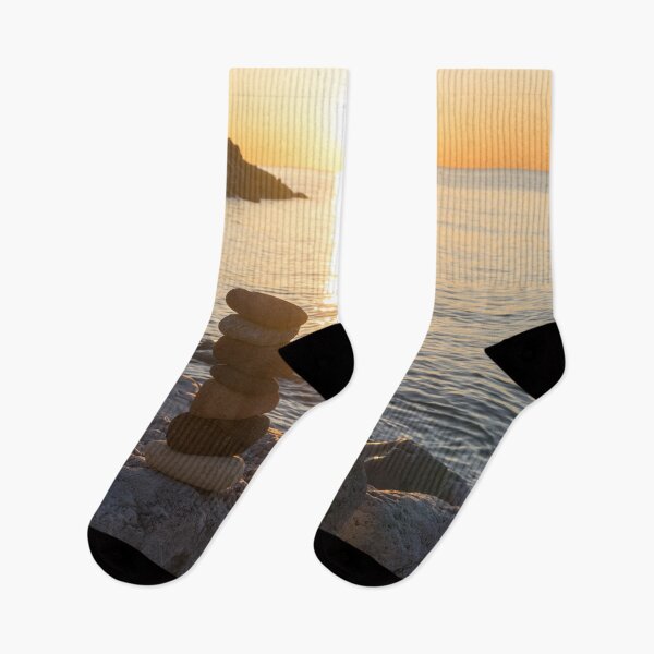 Item preview, Sunrise Over Colorful Stacked Stones by the Shore designed and sold by Georgia Mizuleva.