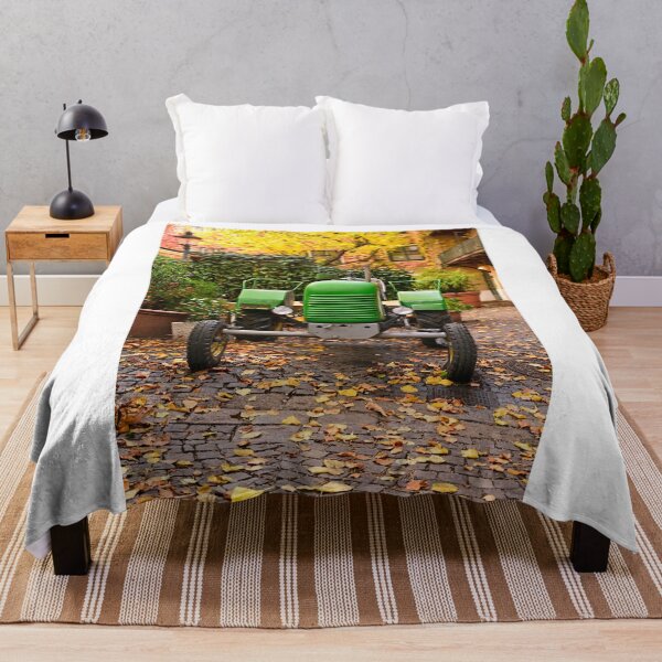 Item preview, Old green tractor in courtyard during Autumn season, Vienna designed and sold by goceris.
