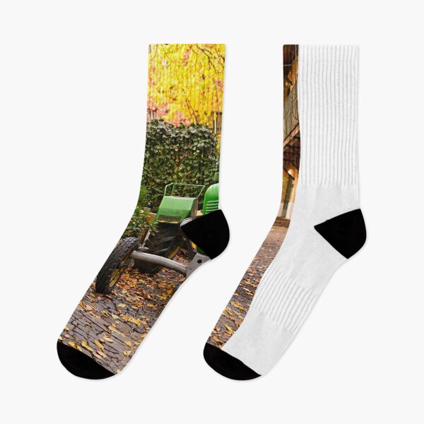 Item preview, Old green tractor in courtyard during Autumn season, Vienna designed and sold by goceris.