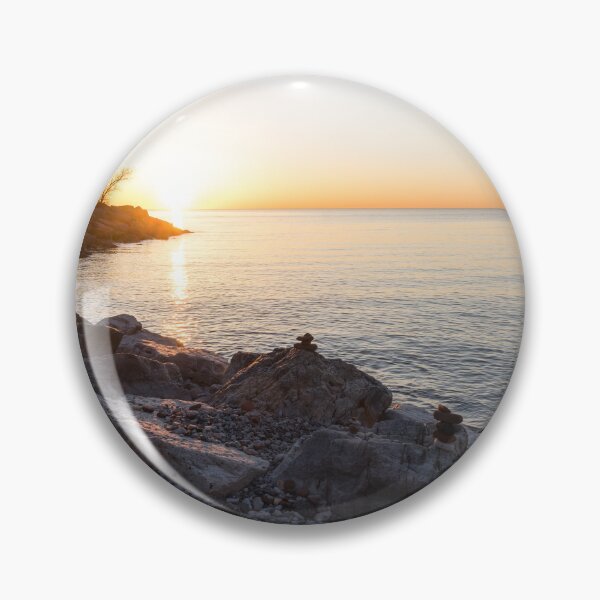 Item preview, Lake Shore Sunrise Over Rough Rocks and Stone Stacks designed and sold by Georgia Mizuleva.