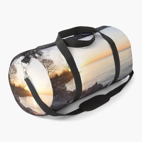 Item preview, Lake Shore Sunrise Over Rough Rocks and Stone Stacks designed and sold by Georgia Mizuleva.