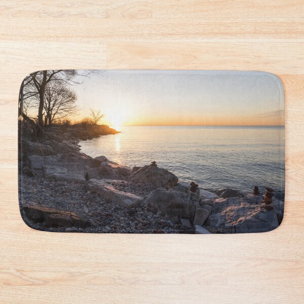Item preview, Lake Shore Sunrise Over Rough Rocks and Stone Stacks designed and sold by Georgia Mizuleva.