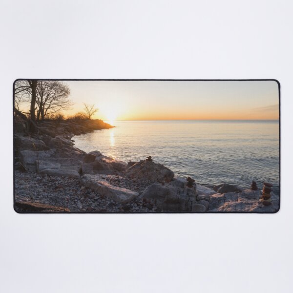 Item preview, Lake Shore Sunrise Over Rough Rocks and Stone Stacks designed and sold by Georgia Mizuleva.