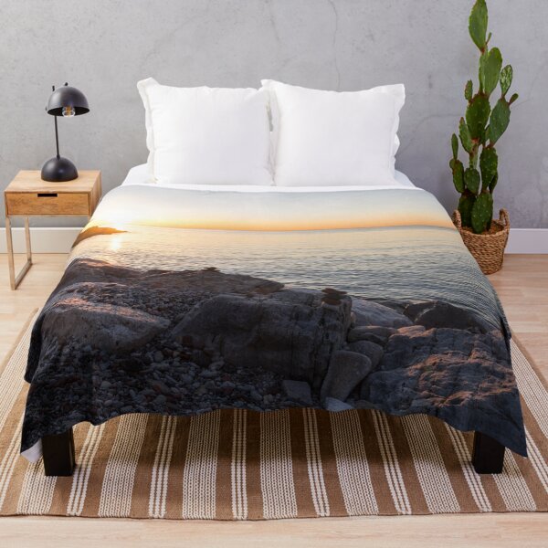 Item preview, Lake Shore Sunrise Over Rough Rocks and Stone Stacks designed and sold by Georgia Mizuleva.