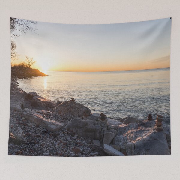 Item preview, Lake Shore Sunrise Over Rough Rocks and Stone Stacks designed and sold by Georgia Mizuleva.