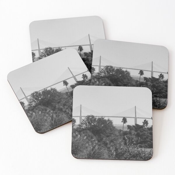 Item preview, The Sunshine Skyway Bridge stretches gracefully across Tampa Bay at dawn, bathed in soft golden light as the new day begins designed and sold by EyezWatchin.