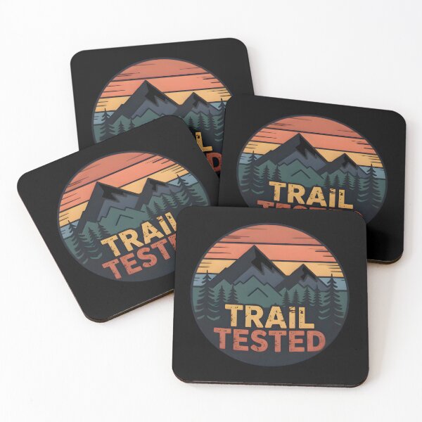 Item preview, “Trail Tested” Retro Hiking Badge T-Shirt – Vintage Outdoor Adventure Design designed and sold by Karolina’s Cozy Creations.
