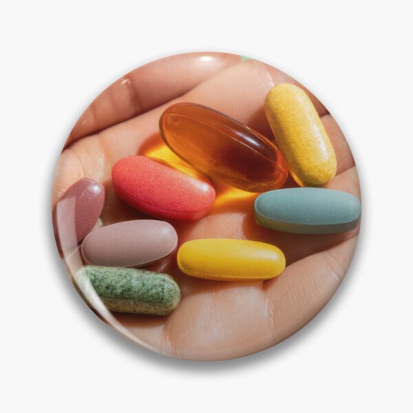 Item preview, Colorful vitamins held in a hand designed and sold by anytka.
