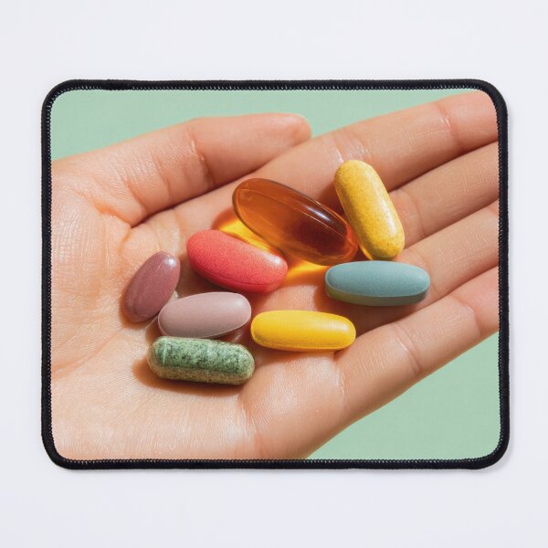 Item preview, Colorful vitamins held in a hand designed and sold by anytka.