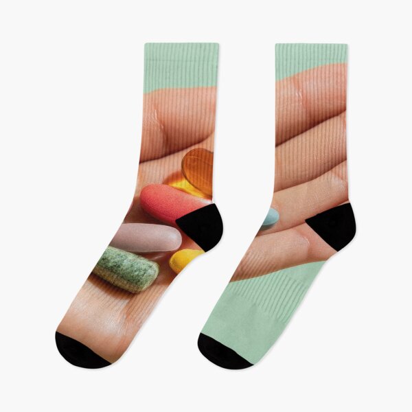 Item preview, Colorful vitamins held in a hand designed and sold by anytka.