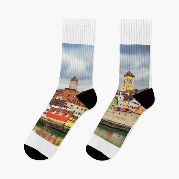 Item preview, Clock tower and colorful old buildings in Regensburg, Germany designed and sold by goceris.