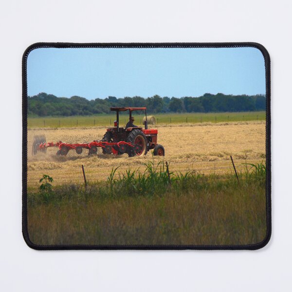 Item preview, Texas rancher on red tractor harvests hay  designed and sold by Visual-Minds.
