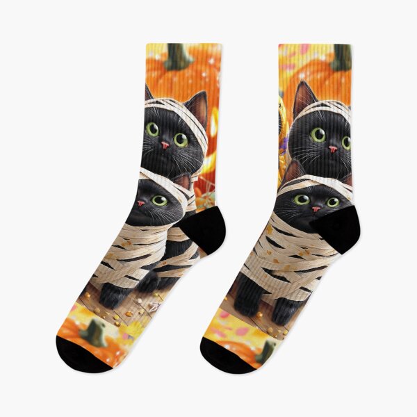 Item preview, Black Cats in Halloween Costumes – Adorable Mummy Kittens with Pumpkins and Spooky Background designed and sold by Grafititee.