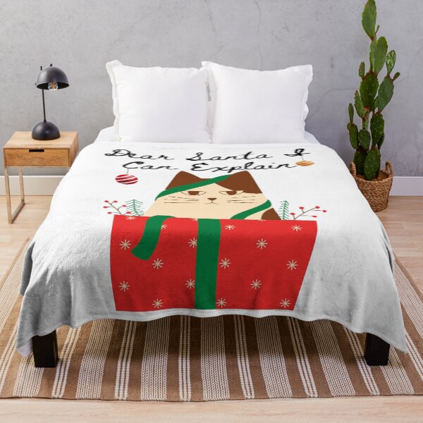 Artikelvorschau, Katze sitzt in einem Weihnachtsgeschenk entworfen und verkauft von Carla Sandstrum.