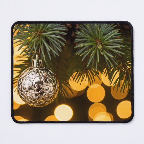 Item preview, Macro shot of an ornate silver ornament hanging on a pine branch with golden bokeh designed and sold by homydesign.