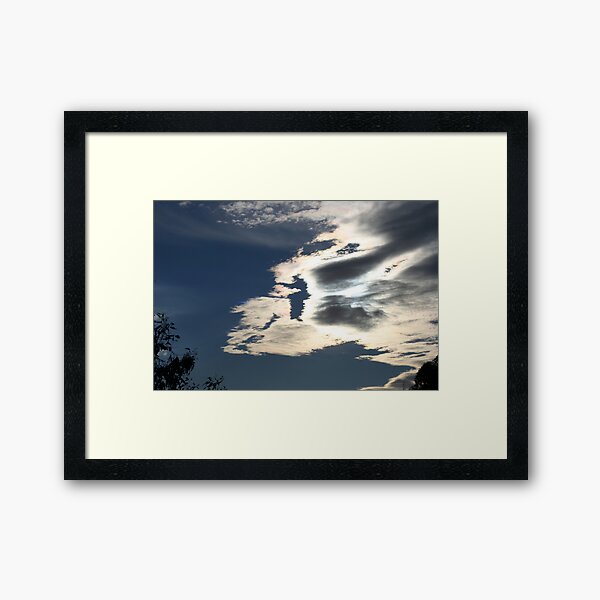 Iridescent clouds Framed Art Print