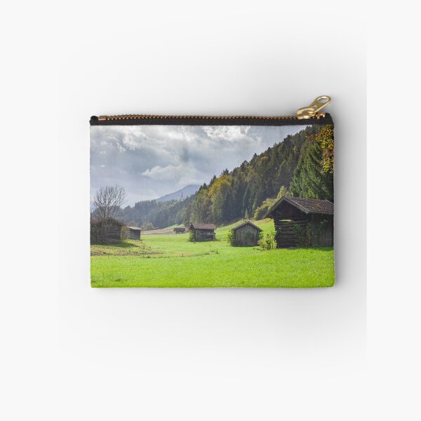 Item preview, Pasture with hay barns and mountains in the Stubai Valley during rain with dark clouds designed and sold by Torsten  Krüger.