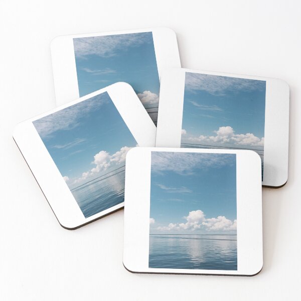 Item preview, White Clouds In Blue Sky Over Calm Waters Photographic Print designed and sold by Mother-Nature65.