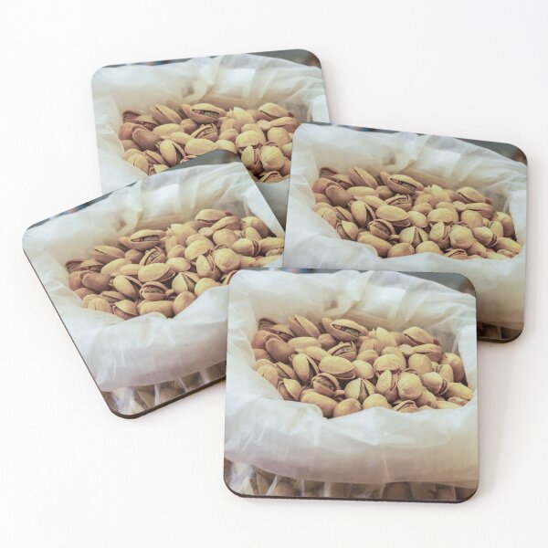 Item preview, Heap of Pistachios in a Clear Plastic Bag Displayed on Market Counter designed and sold by Nmallia.