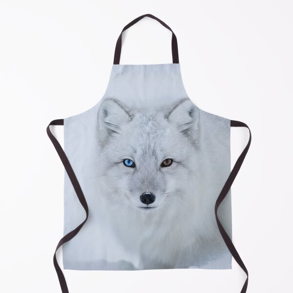 Item preview, Close-up of an Arctic Fox with Heterochromia in Snow designed and sold by homydesign.