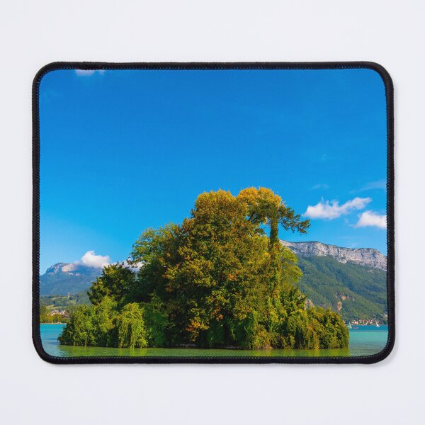 Item preview, View of Lake Annecy with an Island with Trees and Mountain in a Sunny Summer Day designed and sold by Mats Silvan.