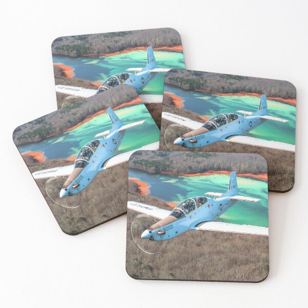 Item preview, Military Tucano Climbing Over the Airfield Region under Clear Skies designed and sold by Skyframe Aviation.