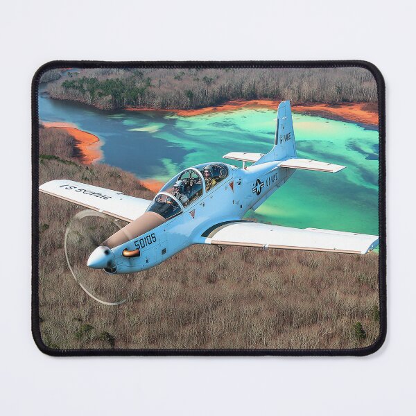 Item preview, Military Tucano Climbing Over the Airfield Region under Clear Skies designed and sold by Skyframe Aviation.