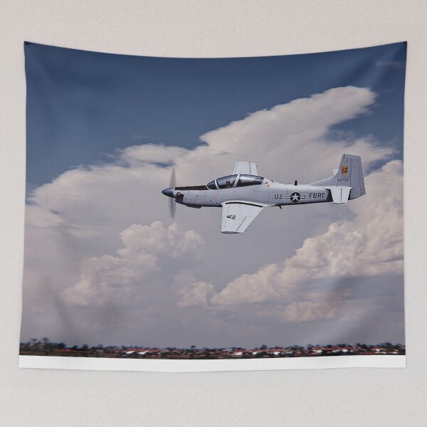 Item preview, Embraer Super Tucano Sweeping Through Rural Landscapes at Dawn designed and sold by Skyframe Aviation.
