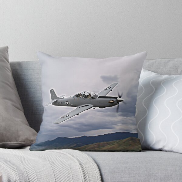 Item preview, Light Attack Super Tucano Climbing Over Rolling Hills in Calm Air designed and sold by Skyframe Aviation.