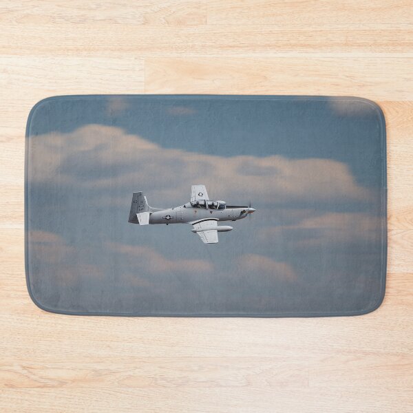 Item preview, Light Attack Super Tucano Maneuvering Through the Hills of Brazil at Dusk designed and sold by Skyframe Aviation.