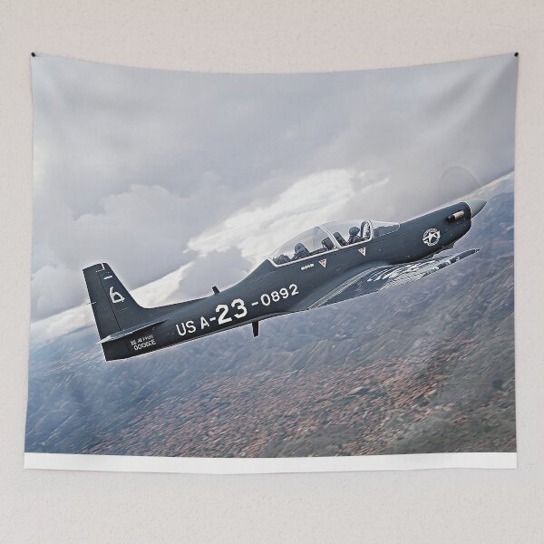 Item preview, Military Tucano Maneuvering Through the Jungle Below at Dusk designed and sold by Skyframe Aviation.
