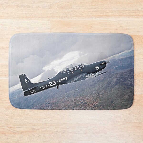 Item preview, Military Tucano Maneuvering Through the Jungle Below at Dusk designed and sold by Skyframe Aviation.