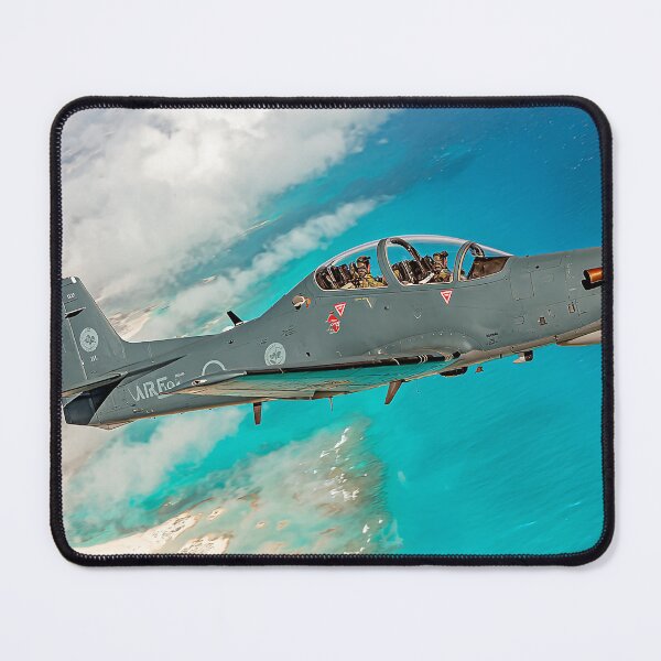Item preview, Agile Super Tucano In Flight Over the Clouds at Dusk designed and sold by Skyframe Aviation.
