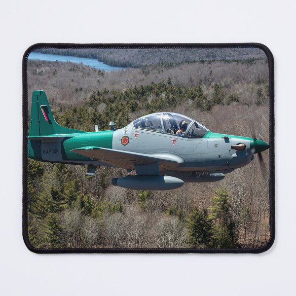 Item preview, Combat Super Tucano In Formation Over Calm Blue Skies in Bright Daylight designed and sold by Skyframe Aviation.
