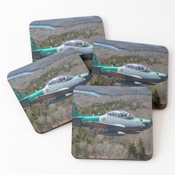 Item preview, Combat Super Tucano In Formation Over Calm Blue Skies in Bright Daylight designed and sold by Skyframe Aviation.