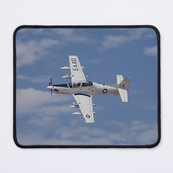 Item preview, Agile Super Tucano Flying Above Rolling Hills at Dusk designed and sold by Skyframe Aviation.