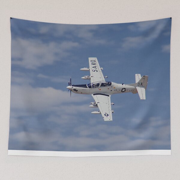 Item preview, Agile Super Tucano Flying Above Rolling Hills at Dusk designed and sold by Skyframe Aviation.