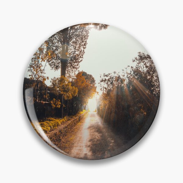 Item preview, Cinematic dirt road leading toward brilliant sunset light with dramatic sun rays and foliage frame. designed and sold by MDB_Shop.
