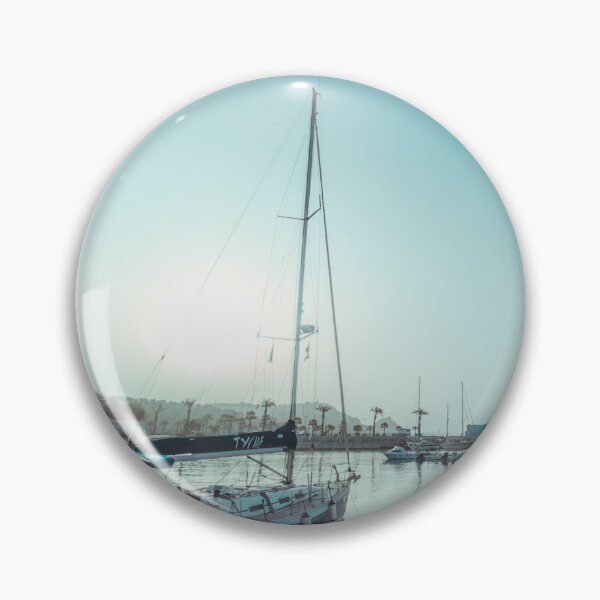 Item preview, Sailing yachts docked in a calm harbor under a bright, turquoise sky. designed and sold by MDB_Shop.