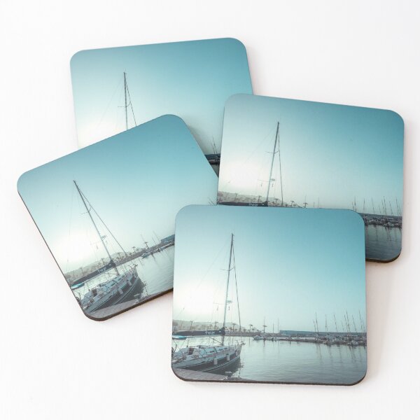 Item preview, Sailing yachts docked in a calm harbor under a bright, turquoise sky. designed and sold by MDB_Shop.