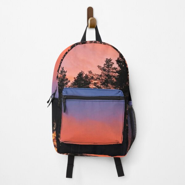 Item preview, Vibrant Sunset Motorex bBehind Tall Trees designed and sold by MolinaTraveler.
