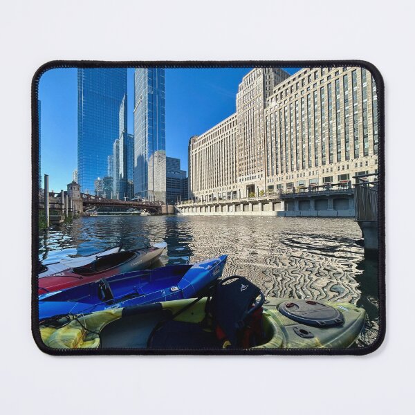 Item preview, Canoe beyond Merchandise Mart on Chicago River designed and sold by vasi imagery.