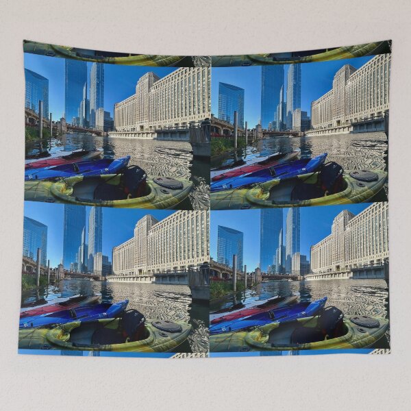 Item preview, Canoe beyond Merchandise Mart on Chicago River designed and sold by vasi imagery.