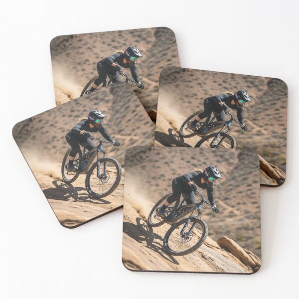 Item preview, Female Biker Descends Rugged Cliff in Harsh Desert Terrain. designed and sold by Hinson MTB Visuals.