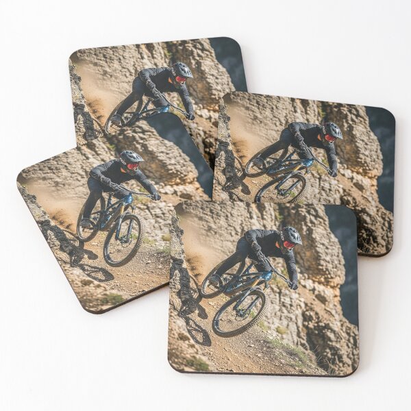 Item preview, Extreme mountain biker on a vertical rock face in a desert environment. designed and sold by Hinson MTB Visuals.