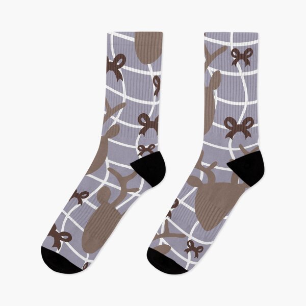 Item preview, Seamless pattern featuring brown reindeer heads and bows over a light purple grid background designed and sold by Crispifly.