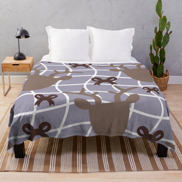 Item preview, Seamless pattern featuring brown reindeer heads and bows over a light purple grid background designed and sold by Crispifly.