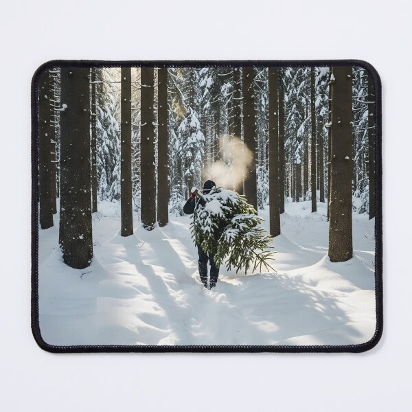 Item preview, Person Carrying a Fresh Cut Pine Tree Through a Snowy Forest designed and sold by homydesign.